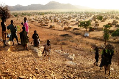 Children play near a site for displaced families in eastern Chad.