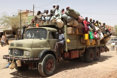 Trucks transporting migrants.