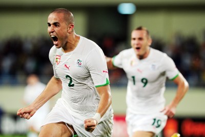 Madjid Bougherra, seen celebrating scoring at a previous tournament, is back in Algeria's side.