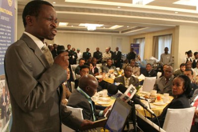 Kenya Anti-Corruption Commission director Prof Patrick Lumumba addresses Rotary club members during the Rotary corporate breakfast at Sankara Hotel.