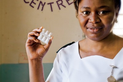 A nurse displays anti-retroviral (ARV) pills.