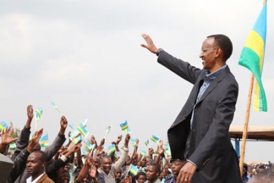 Rwandan President Paul Kagame greets a crowd (file photo): Kagame said the new fund will not replace traditional sources of state revenues, including donor aid, but will supplement them.