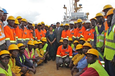 President Sirleaf and ArcelorMittal's Liberian employees