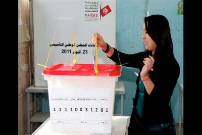 A voter casting her ballot.