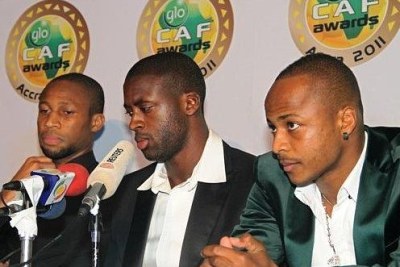 Yaya Toure of Cote dIvoire (centre) and Mali's Seydou Keita (left) at the CAF Awards 2011.