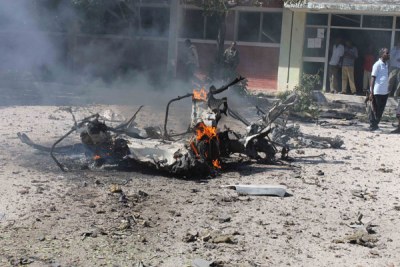 The wreckage of the car bomb after it exploded outside a Somali government building in Mogadishu on February 17, 2012.