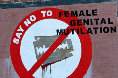 Graffiti opposing female genital mutilation or cutting.