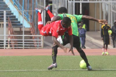 LAs V. Club de la RDC (vert) contre Dynamic FC du Togo (rouge) le 17/2/2013 au stade de Martyrs à Kinshasa, lors du match aller du tour préliminaire de la Ligue des champions de la Caf. Score : 3-0.