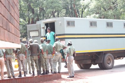 Prominent Zimbabwean human rights lawyer Beatrice Mtetwa was arrested for allegedly obstructing the course of justice. She is pictured here existing a police van as she arrived at the Harare Magistrates Court on Mar. 20.