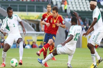 Nigeria at bay as Spain weave through.