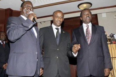CORD candidate Mutula Kilonzo Jr. with the coalition's leaders former PM Raila Odinga and former VP Kalonzo Musyoka.