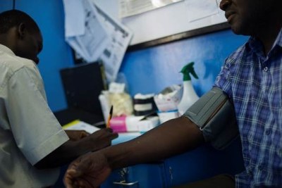 A HIV positive homosexual man has his blood pressure checked at a VCT clinic supported by the Global Fund via the Kenyan Red Cross.