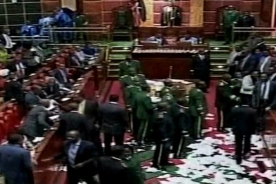 Chaos has erupted in Kenya's parliament as the opposition protests against the passing of the Anti-Terror Law.