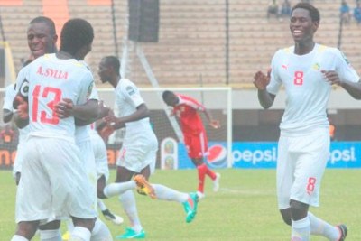 Les Lionceaux du Sénégal célébrant leur victoire synonyme de qualification en finale du CHAN U20