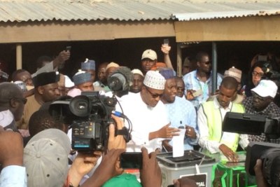 All Progressives Congress Presidential Candidate, Muhammadu Buhari, casting his vote at exactly 5 p.m. in his polling unit PU 003 in Daura