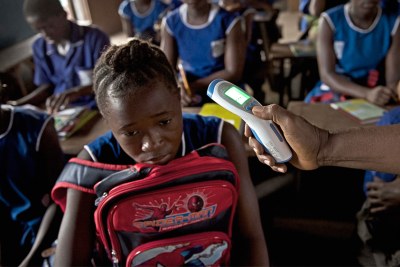 As children in Sierra Leone finally resumed classes almost nine months after the Ebola outbreak, they were greeted by teachers carrying digital thermometers.