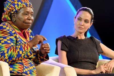 African Union chair Nkosazana Dlamini-Zuma and United Nations Special Envoy for Refugee Issues, actress Angelina Jolie Pitt, discussing the empowerment of women during the AU Summit in Johannesburg.