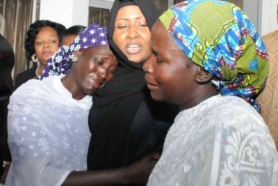 Mrs Aisha Buhari, centre, wife of Nigeria's president, meets mothers of two abducted girls from Chibok who are still missing.