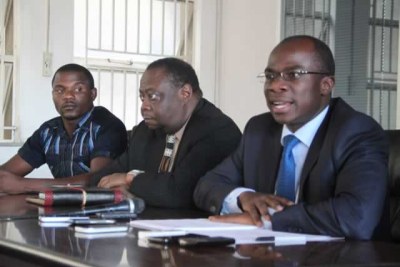 Charles Manyuchi (left), Godfrey Chipare, permanent secretary in the Sports Ministry (middle), Makhosini Hlongwane, Sports and Recreation Minister (right).