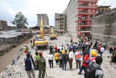 Members of the public at the scene where a building collapsed in Huruma, on May 5, 2016. Most of the buildings set to be demolished are in Huruma estate.