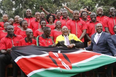 President Uhuru Kenyatta poses with Kenya's Rio Olympics team at State House.