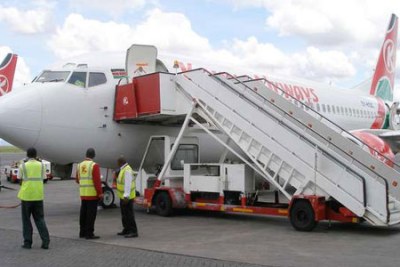 Kenya Airways engineers conduct pre-flight checks on an airplane (file photo)