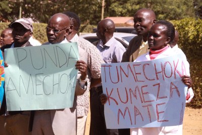University Academic Staff Union’s Moi University chapter officials and members demonstrating in Eldoret (file photo)