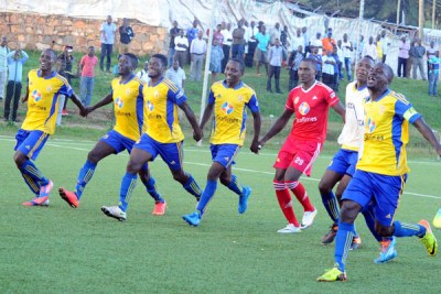 KCCA players celebrate their championship victory before the VIP box at Lugogo.