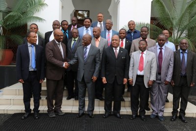 President John Magufuli and visiting Ethiopian Minister for Water and Irrigation Seleshi Bekele shake hands shortly after having a group photo with Ethiopian dam experts at the State House in Dar es Salaam.