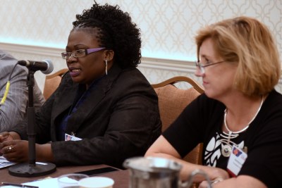 T'sepiso Mosasane, Lesotho's director of Immigration (left) and Barbara Keating, president of Computer Frontiers, participating in a tourism panel during the U.S.-Africa Business Summit.