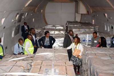 IEBC officials inspect ballot papers at the Jomo Kenyatta International Airport in Nairobi (file photo).
