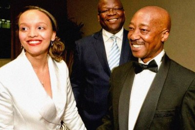 SARS Commissioner Tom Moyane, right, and Chief Officer Jonas Makwakwa, centre, with his girlfriend, Kelly-Ann Elskie (file photo).