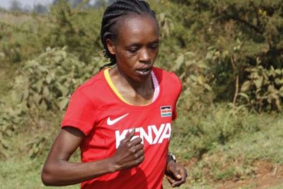 London Marathon and Olympic champion Jemimah Sumgong jogs during a past training session.