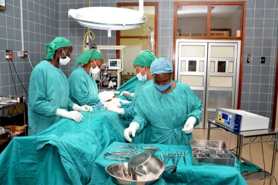 Doctors in theatre at Nsambya hospital recently.