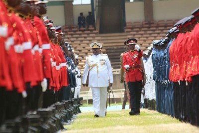 Chief of Defence Forces Samson Mwathethe inspects a guard of honour as the military prepares for the swearing-in of Uhuru Kenyatta at Kasarani on November 22, 2017.