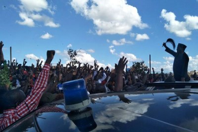 Nasa leader Raila Odinga addresses his supporters on Mayanja Road before police stopped his march to Jacaranda grounds on November 28, 2017.