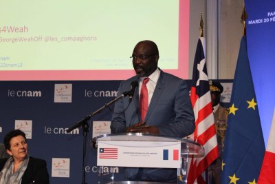 President George Weah delivering a speech in Paris.