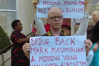 Malawians protest against abduction and murder of a 22-year-old person with albinism, Mcdonald Masambuka of Machinga.