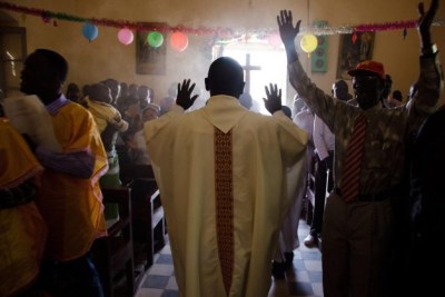 South Sudanese Christians celebrate Christmas mass at El Fasher church in North Darfur. South Sudan's different churches have remained one of the country's few stable institutions.
