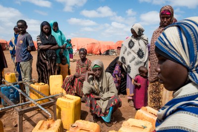 Somalis who fled conflict and drought collect water at a shelter camp in Baidoa, Somalia. (file photo).