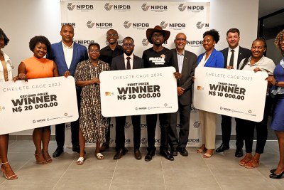 Executive Director of MSME Development, Innovation, and Acceleration at NIPDB, Dino Ballotti and Lead Private Sector Specialist at the World Bank, Ganesh Rasagam pose with the winners and judges of the Chelete Cage 2023